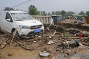中国「豪雨で20人死んだと言ったな。あれは嘘だ」
