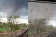 竜巻vs電車。逃げようが無い状況で竜巻が迫ってくる恐怖映像。