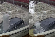 車に乗った瞬間、凍った雪の塊がフロントガラスを直撃！慌てて降りるもサイドブレーキをかけ忘れ…（ロシア）